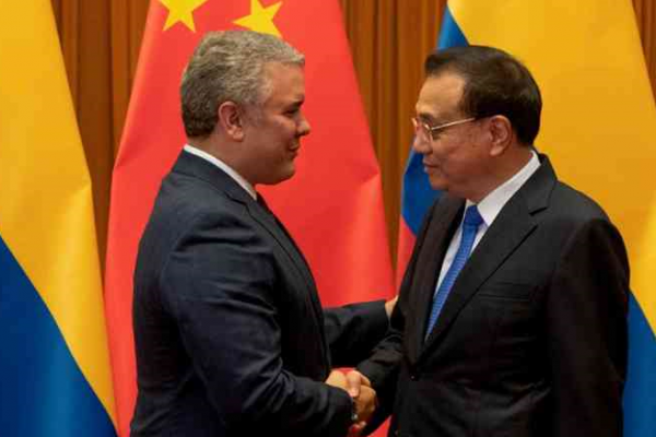 Colombia y China firman tratado para repatriación de reclusos